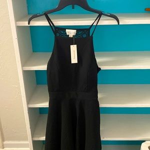 Medium Francesca’s Collection black backless dress